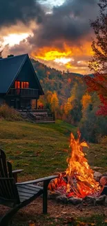 Cabin with a fire pit in an autumn sunset landscape.