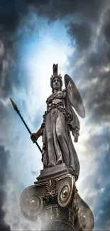 Athena statue with dramatic sky background.