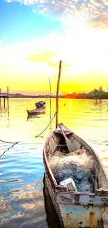 Peaceful sunset over a tranquil lake with boats and vibrant colors.