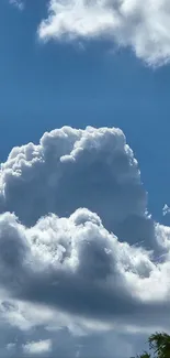 Vibrant blue sky with fluffy white clouds.