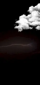 Dark sky with clouds and subtle lightning strike.