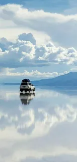 Van traveling on reflective water with a cloudy sky backdrop.