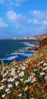 A beautiful coastal scene with daisies and ocean waves.