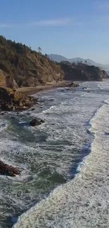 Serene coastal landscape with waves and cliffs under a blue sky.