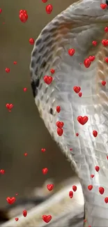 Majestic cobra with red hearts on a nature-inspired wallpaper.