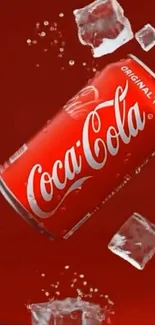 Coca-Cola can with ice cubes on red background.