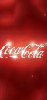 Coca-Cola logo on vibrant red background.