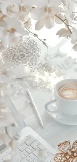 Cup of coffee with white orchids and keyboard on desk.