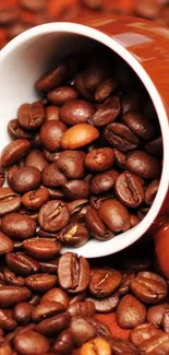 Coffee beans spilling from a rustic brown mug.