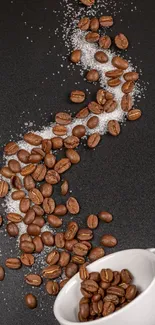 Dark wallpaper with coffee beans spilling from a white cup on a dark surface.