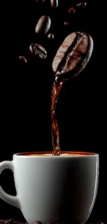 Coffee beans pour into a steaming cup on a dark background.