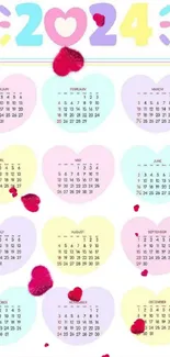 Pastel heart-shaped 2024 calendar wallpaper with colorful monthly designs.