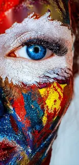 Colorful artistic face with vibrant paints and blue eye.