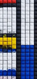 Colorful LEGO block abstract art with red, blue, yellow, and white design.