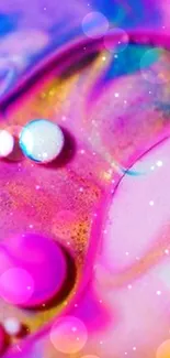 Abstract colorful liquid art wallpaper with vibrant pink and purple swirls.