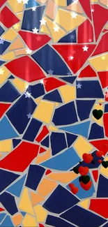 Colorful abstract mosaic wallpaper with red, blue, and yellow geometric shapes.