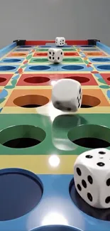 Colorful arcade game with rolling dice on a vibrant board.