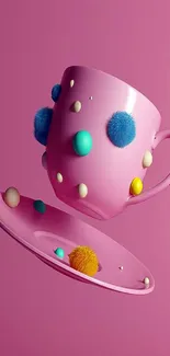 Pink mug with colorful balls on a pink background wallpaper