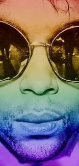 Close-up of a face with round sunglasses in rainbow gradient colors.