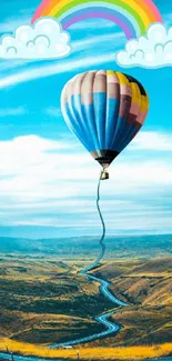 Hot air balloon in colorful landscape with rainbow clouds.