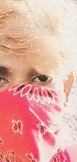 Stylish person with pink bandana and trendy hair in natural light.