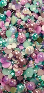 Vibrant wallpaper with colorful beads in pink, teal, and purple hues.