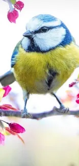 Colorful bird perched on a blossoming branch with vibrant surroundings.