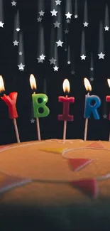 Colorful birthday cake with candles lit up against a dark background.