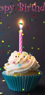 Happy Birthday cupcake with lit candle in vibrant colors.