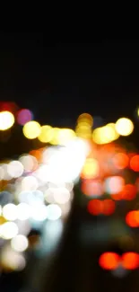 Colorful bokeh city lights at night, creating an abstract and vibrant display.