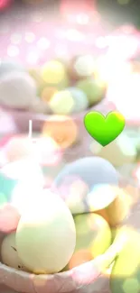 Pastel bokeh mobile wallpaper with green heart overlay.