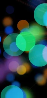 Vibrant bokeh wallpaper with colorful glowing circles on a black background.