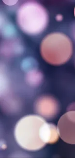 Colorful bokeh mobile wallpaper with purple, pink, and orange hues.