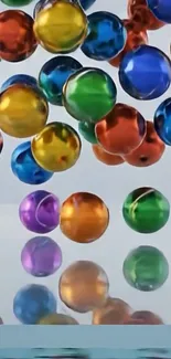 Vibrant bouncing colorful balls with reflections on water surface.