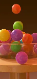 Vibrant 3D balls in a glass bowl on a wooden table.