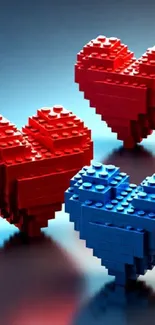3D red and blue brick heart shapes on reflective surface.