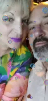 Colorful couple portrait with bubbles effect.