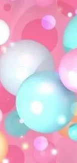 Colorful bubbles on a pink background mobile wallpaper.