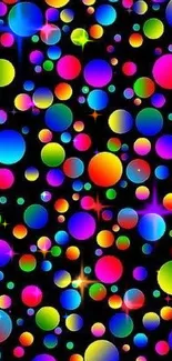 Colorful bubble pattern wallpaper with rainbow circles on black background.