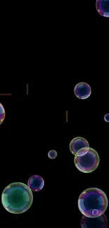 Colorful bubbles floating on a black background wallpaper.