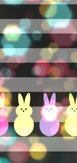 Colorful pastel bunnies on dark stripes wallpaper.