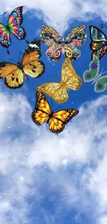 Colorful butterflies flying against a blue sky with white clouds.