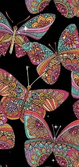 Colorful butterflies with intricate patterns on a black background.