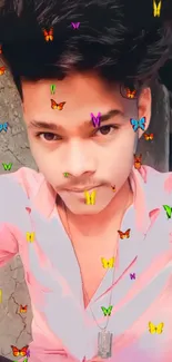 Young man with colorful butterflies overlay on wallpaper.