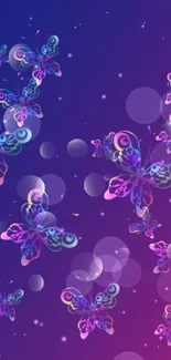 Vibrant gradient wallpaper with colorful butterflies on a purple and pink background.