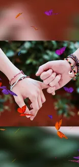 Hands holding with colorful butterflies and greenery.