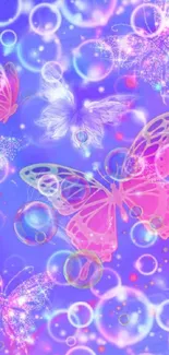 Colorful fantasy butterfly wallpaper with purple hues and sparkles.