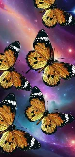 Orange butterflies against a galaxy background featuring vibrant cosmic colors.