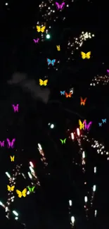 Night sky with colorful butterflies and fireworks.