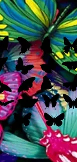 Bright and colorful butterfly wallpaper with dark silhouettes.